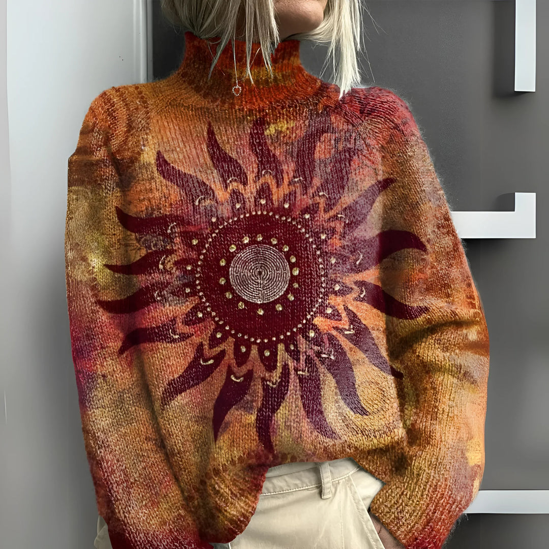 Eline - Warm knitted high-neck sweater with tribal sun